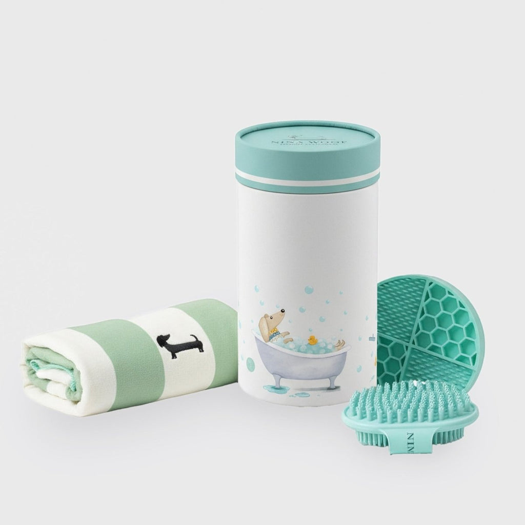 Dog bath kit with a silicone brush, towel, and lick mat
